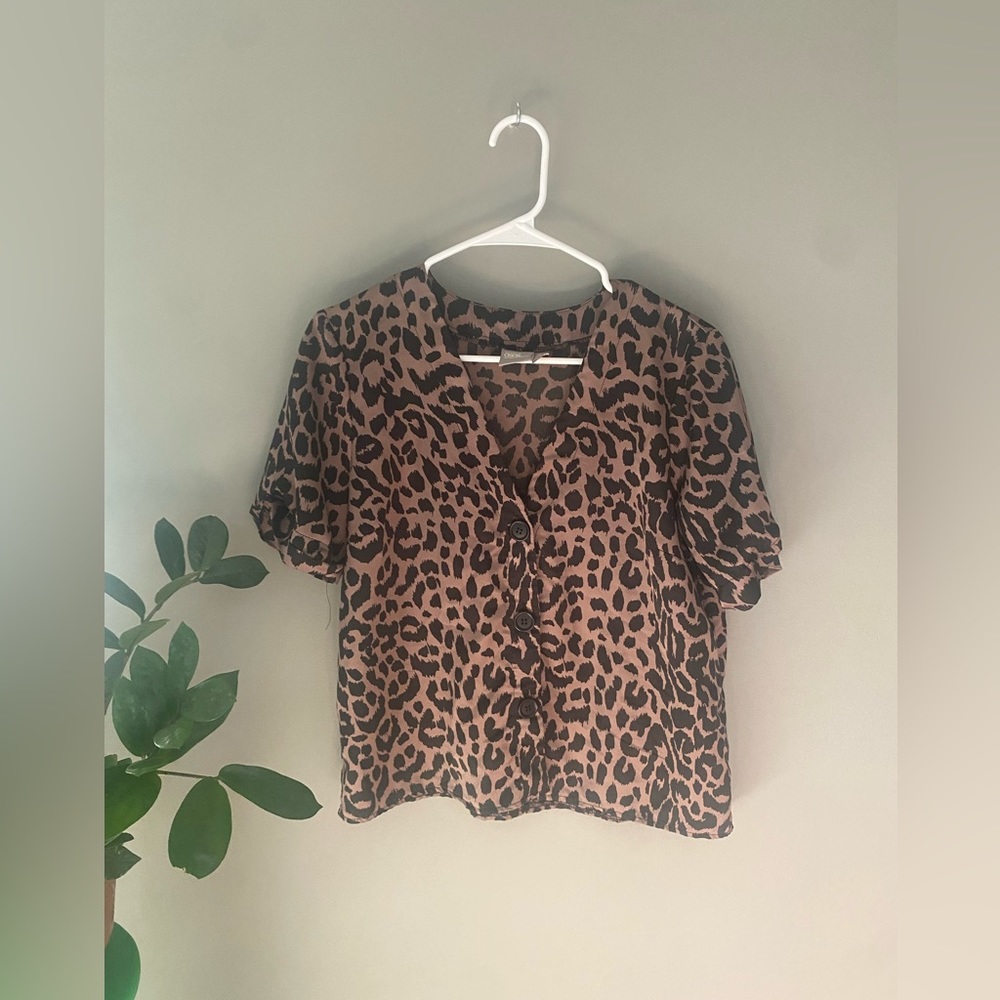 Leopard print silk bowler shirt